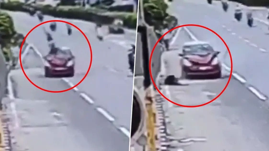 A man was hit while crossing the road while talking on his mobile, a horrifying video surfaced