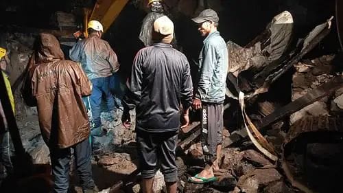 Two people were buried under debris falling on a kutcha house during heavy rains, one died and one got injured