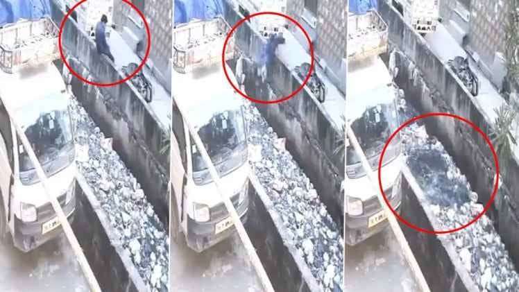 A man was sitting on the wall of the drain, suddenly lost his balance and then died after falling down, CCTV footage surfaced