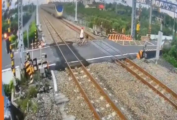 While crossing the railway track, a train suddenly came at a high speed, the heart-wrenching video went viral on the internet